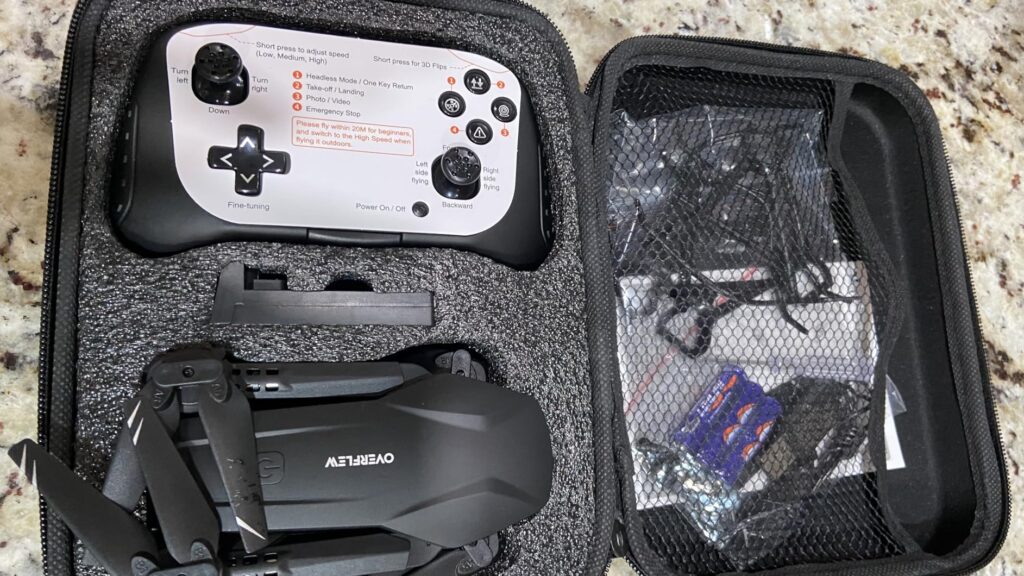 unboxing showing the inside of the drone carrying case that comes with the drone and controller