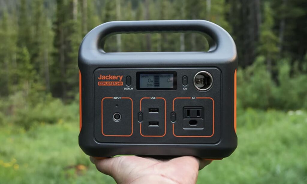 Image of a Jackery Explorer 240 used while camping outdoors